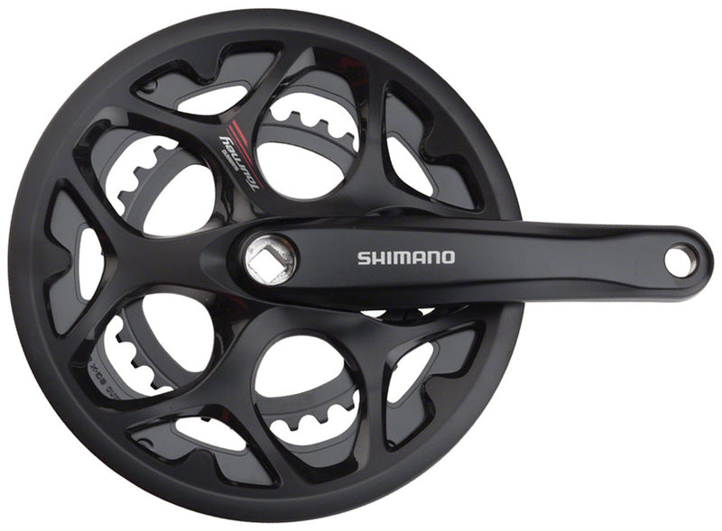 Load image into Gallery viewer, Shimano Tourney FC-A070 Crankset - 170mm 7/8-Speed 50/34t Riveted Square Taper JIS Spindle Interface BLK With Chainguard