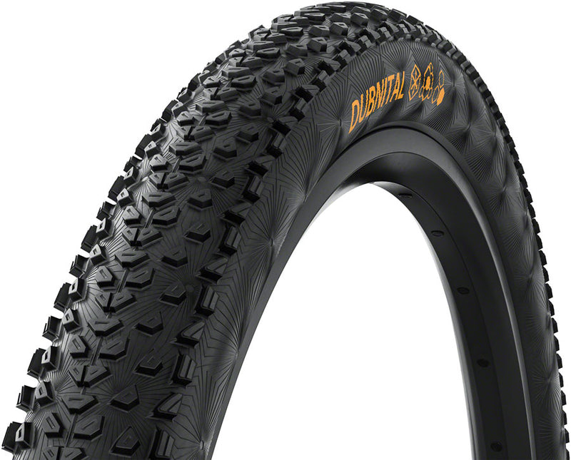 Load image into Gallery viewer, Continental Dubnital Tire - 29 x 2.40 Tubeless Folding BLK Rapid Trail Casing E25
