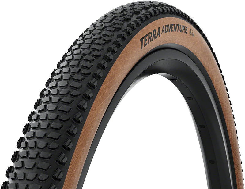Load image into Gallery viewer, Continental Terra Adventure Tire - 700 x 45 Tubeless Folding BLK/Transparent Grip Trail Casing E25
