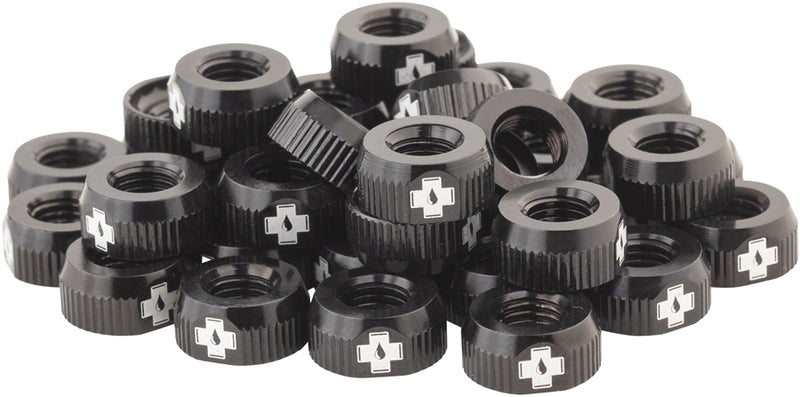Load image into Gallery viewer, Muc-Off Tubeless Valve Box Refill -  Black Lock Nut Pack of 40
